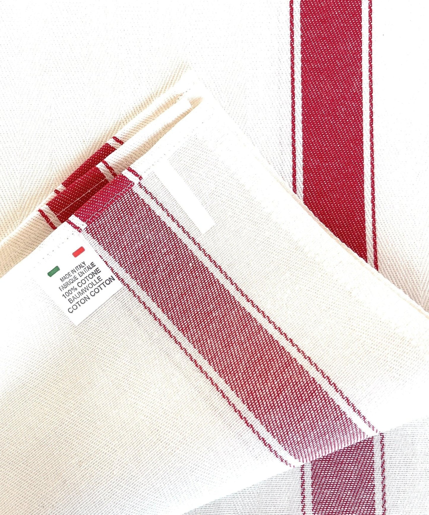 Asciuga piatto in cotone con ricamo coccinelle e banda rossa, dettaglio fronte con decoro e retro con etichetta 100% cotone Made in Italy