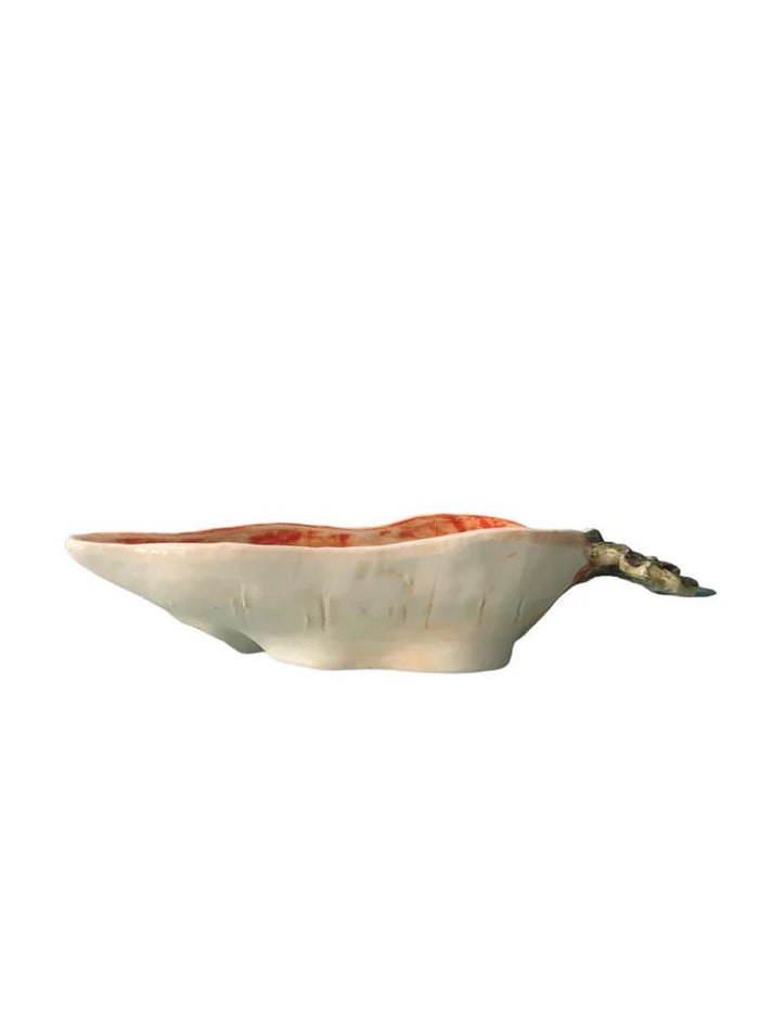 Vista laterale bolo in ceramica smaltata a forma di carota Virginia Casa