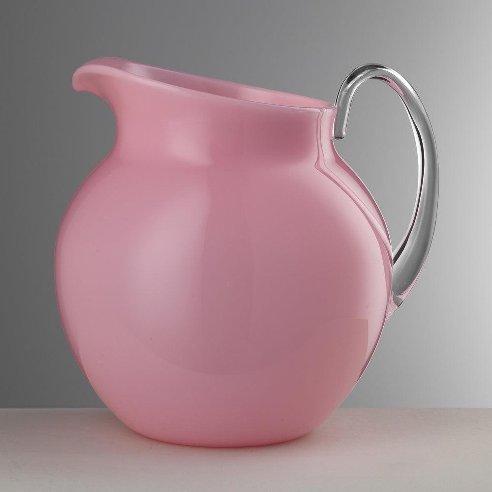 Brocca Pallina rosa con manico trasparente in cristallo acrilico di Mario Luca Giusti dal design arrotondato e moderno