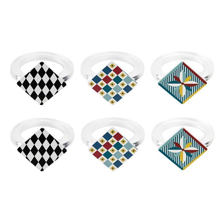 Set 6 ferma tovaglioli Vesta modello Foulard in acrilico trasparente decorato a mano, con motivo optical nero e bianco e cornice multicolor