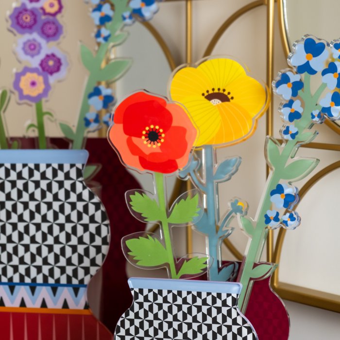 Collezione Vesta: fiori e vasi in cristallo acrilico per una casa moderna e raffinata