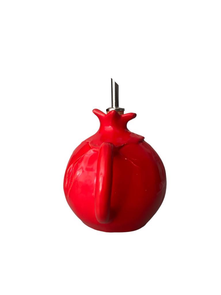 Ampolla olio in ceramica rossa a forma di melograno lato manico Virginia Casa

