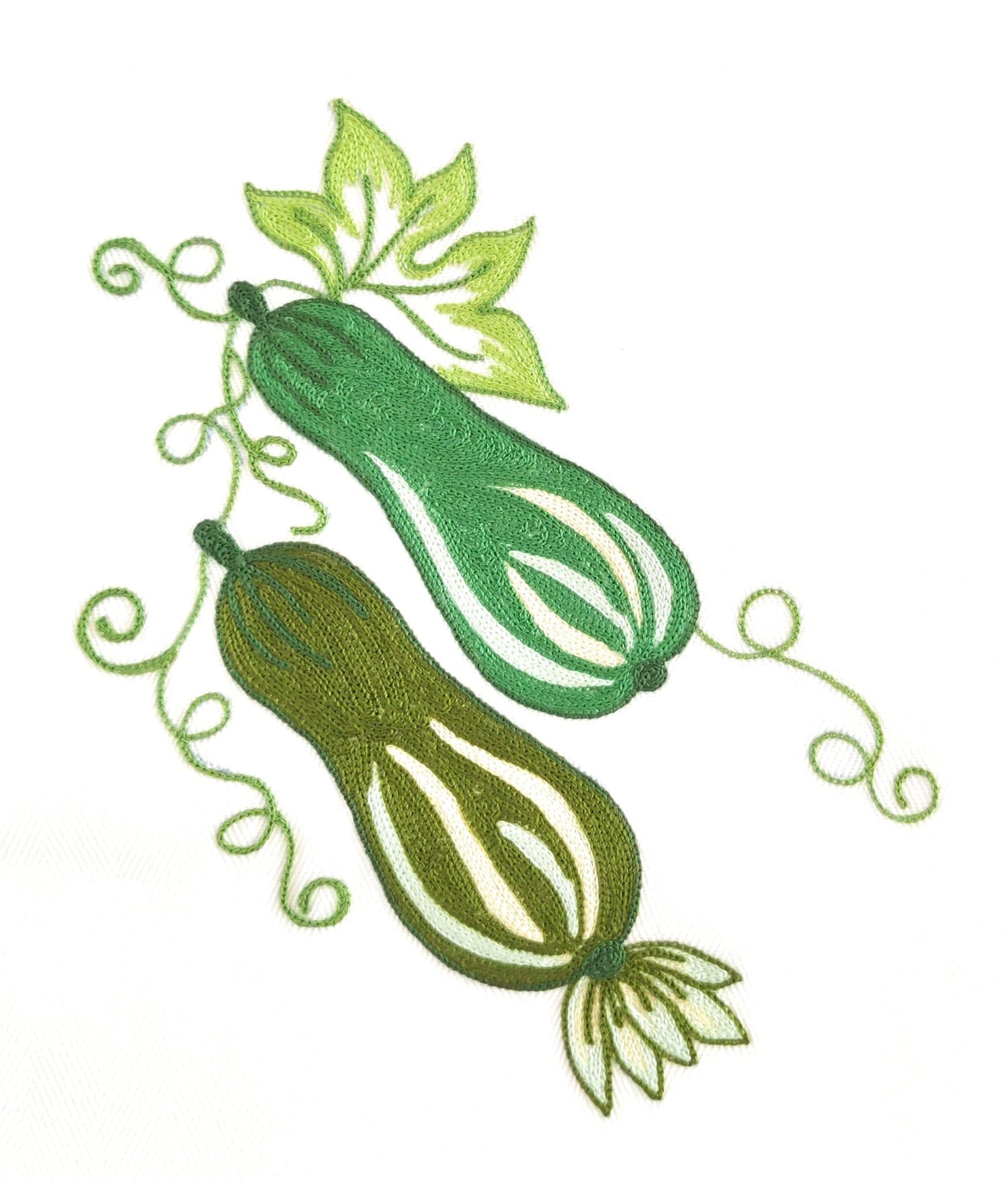 Particolare ricamo zucchine su cotone bianco Made in Italy