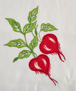 Particolare ricamo ravanelli su cotone bianco Made in Italy