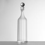 Bottiglia Bona in cristallo acrilico trasparente con tappo trasparente – Mario Luca Giusti