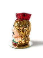 Profilo laterale destro del candelabro Moro uomo in vetro e resina, capelli dorati e dettagli lavorati a mano