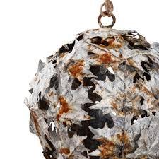 Boule décorative en fer avec des feuilles : nature et design pour votre maison