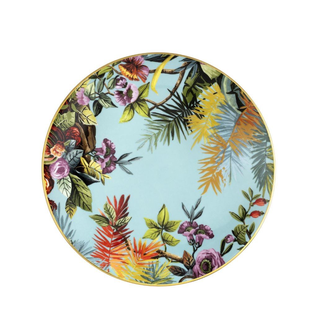 Piatto piano Exotic Jungle Heavenly di Simone Guidarelli in porcellana con fondo azzurro e decorazioni botaniche tropicali.