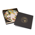 Piatti piano rose Exotic Jungle di Simone Guidarelli con confezione regalo elegante nera e dettagli dorati.