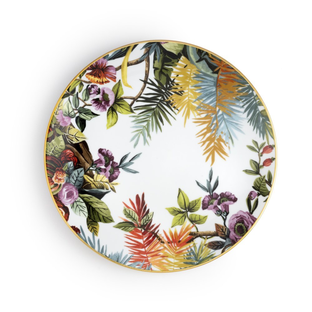 Piatto piano Exotic Jungle White di Simone Guidarelli in porcellana bianca con motivi tropicali e bordo dorato.