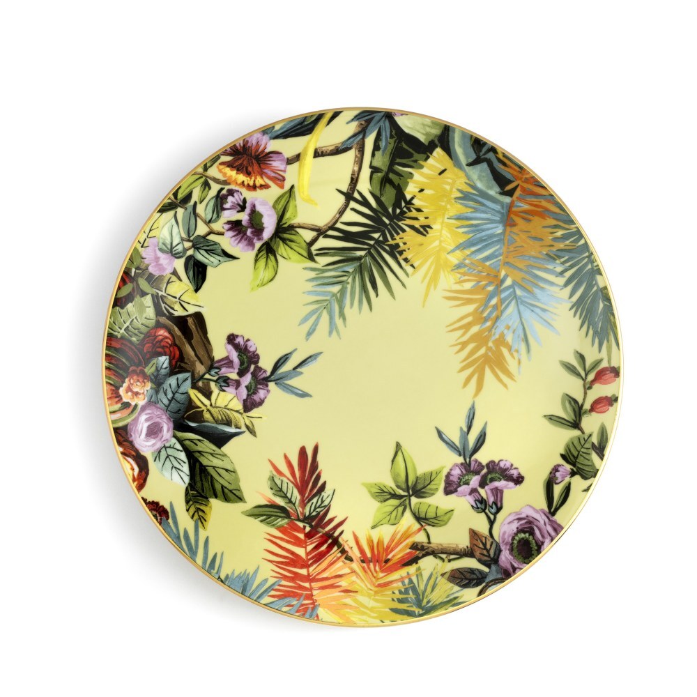 Piatto piano Exotic Jungle Avocado di Simone Guidarelli in porcellana verde avocado con decorazioni botaniche tropicali.