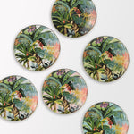 Collezione di piatti frutta Exotic Jungle di Simone Guidarelli in diverse varianti colore con decorazioni tropicali.