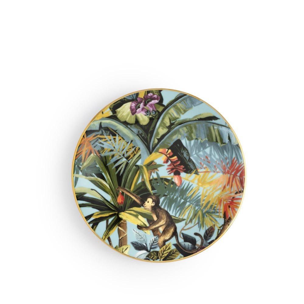 Piatto frutta Exotic Jungle Heavenly di Simone Guidarelli con motivi tropicali e scimmia su fondo azzurro chiaro.
