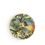 Piatto frutta Exotic Jungle Avocado di Simone Guidarelli con decorazioni tropicali e scimmia su fondo verde avocado.