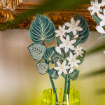 Composizione Funny Flowers Vesta con foglie maranta e giglio