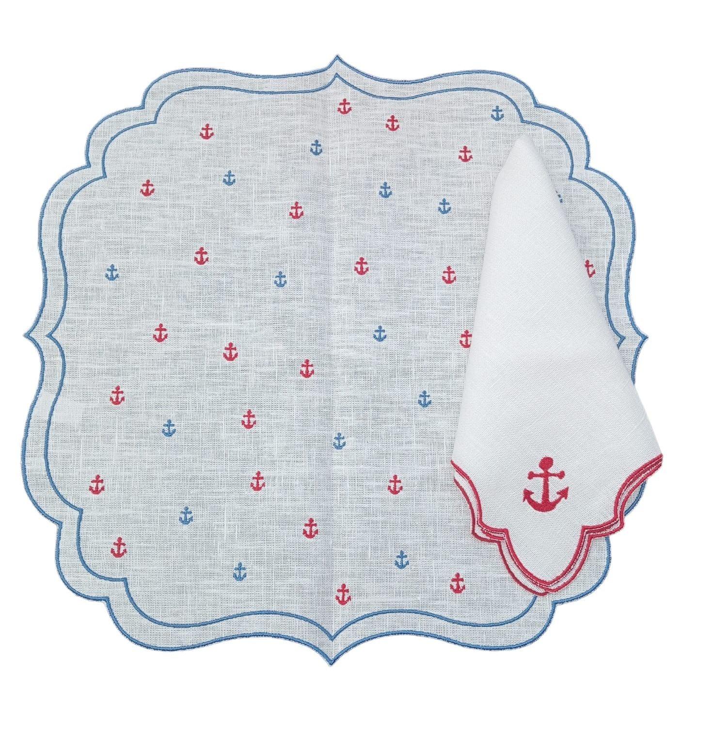 Americano in lino cerato con ricamo ancore rosse e blu e tovagliolo piegato con ancora rossa