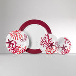 Set piatti Corallo rossi in melamina Mario Luca Giusti con decori marini: fondo, piano e dessert abbinati e sottopiatto 

