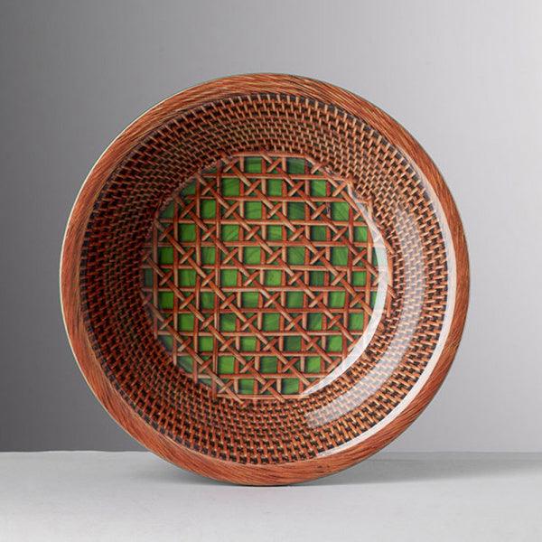 Piatto fondo verde Patagonia in melamina di Mario Luca Giusti con bordo irregolare e texture effetto minerale