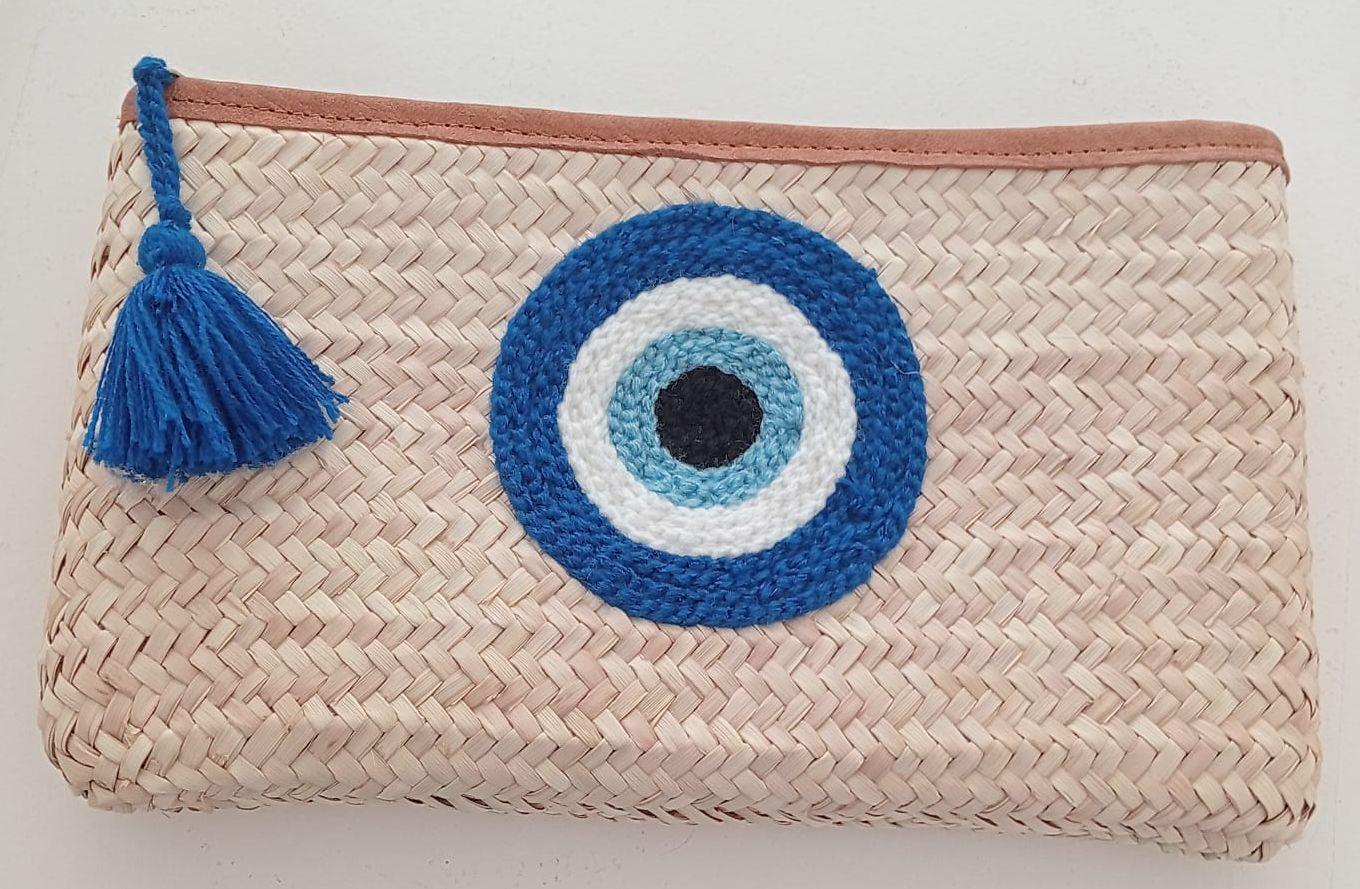 Pochette rectangulaire faite à la main et tissée en feuilles de palmier avec broderie en laine, motif Oeil d'Allah