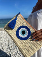 Pochette estiva in paglia naturale con ricamo Nazar blu occhio portafortuna Marika Selection