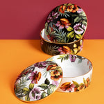 Portagioie Exotic Jungle Simone Guidarelli nelle varianti Black e White con decori tropicali