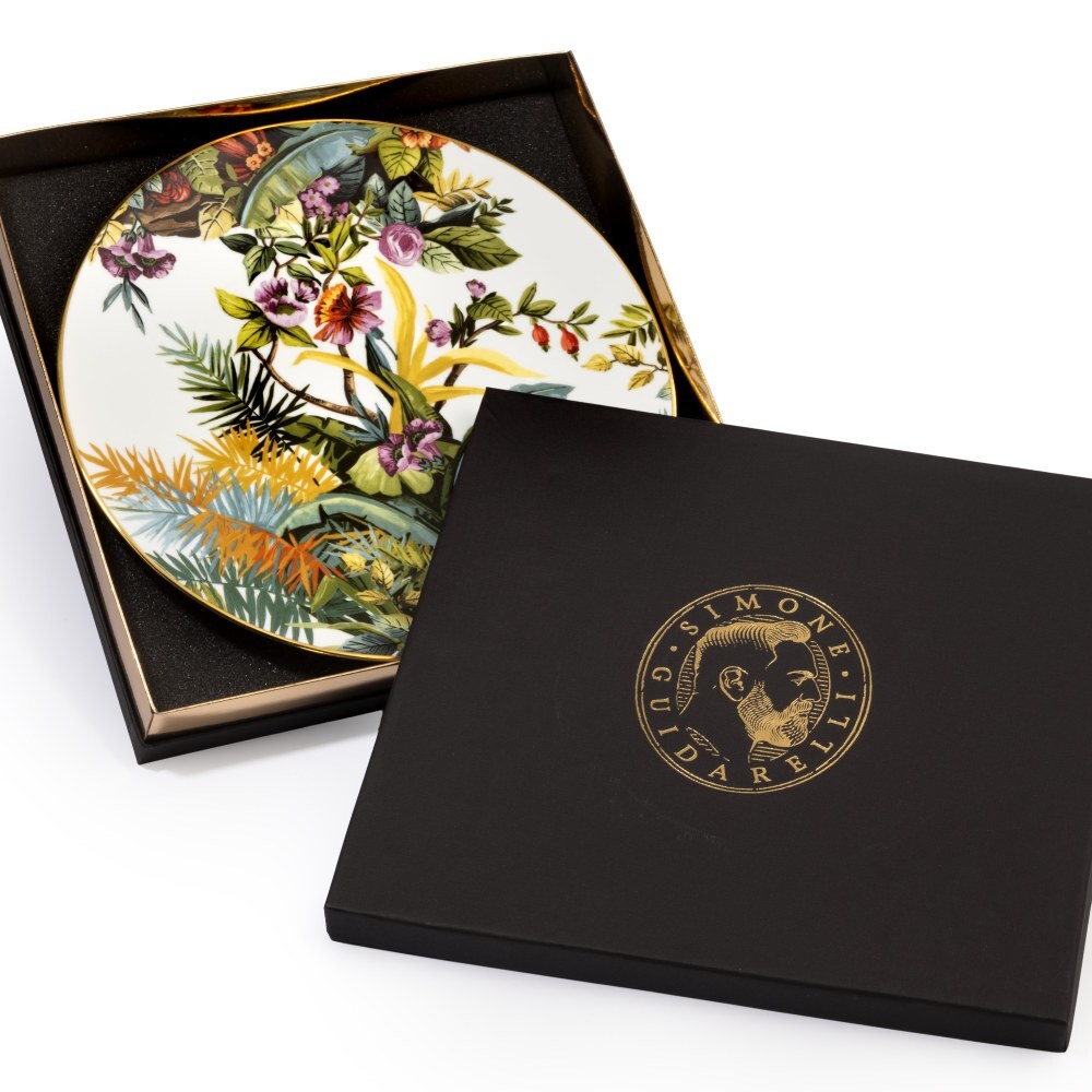 Sottopiatto Exotic Jungle White di Simone Guidarelli con elegante confezione regalo nera e dettagli oro.
