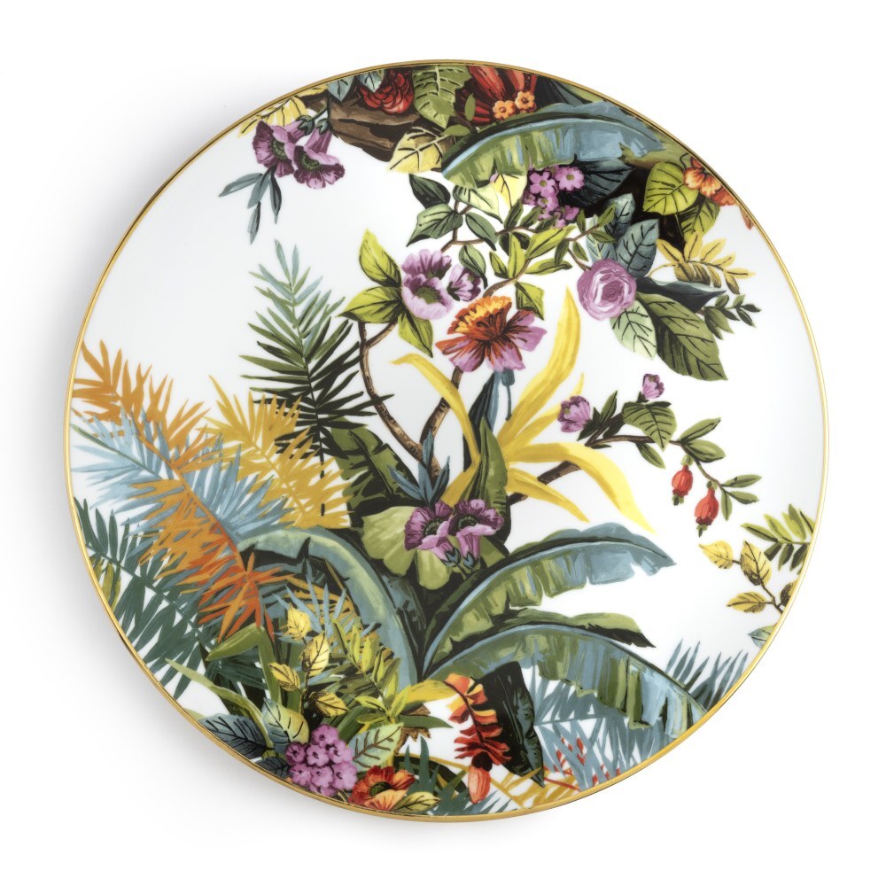 Sottopiatto Exotic Jungle White di Simone Guidarelli in porcellana con decorazioni tropicali botaniche e bordo dorato.