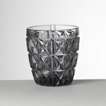 Bicchiere Stella grigio fumé in acrilico effetto cristallo firmato Mario Luca Giusti, resistente e raffinato