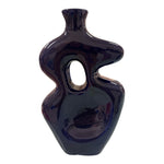 Vaso scultoreo in ceramica blu notte con apertura centrale