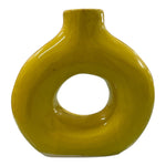 Vaso piccolo in ceramica gialla lucida con foro centrale, forma arrotondat