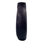 Vaso artigianale blu notte in ceramica visto di lato, forma moderna e scultorea.